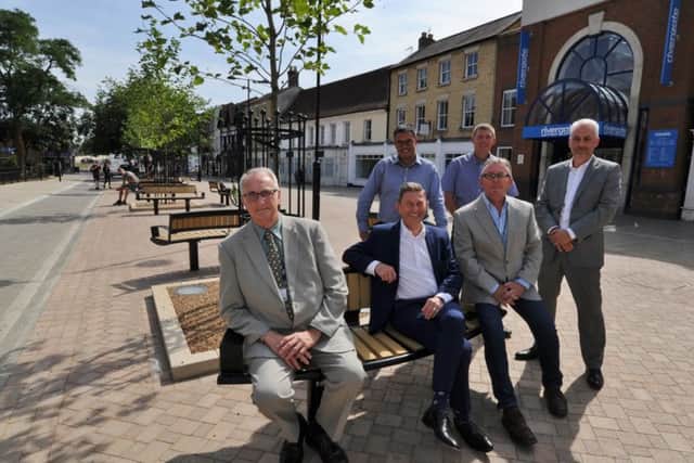 Coun John Holdich, Peter Hiller and Steve Allen with Simon Machen (city council), David Edevane (Skanska) and at the back Chris Bower (Durman Stearn - wearing glasses) looking at the completed work at Lower Bridge Street EMN-170717-163223009