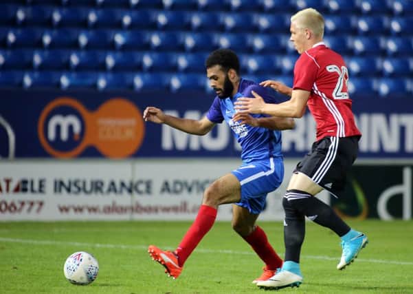 Alex Penny in action for Posh against Ipswich. Photo: Joe Dent/theposh.com.