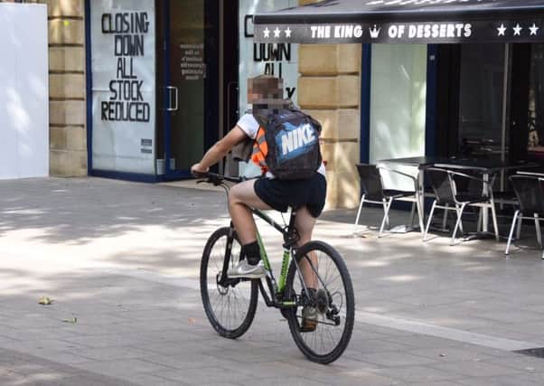A cyclist in Bridge Street