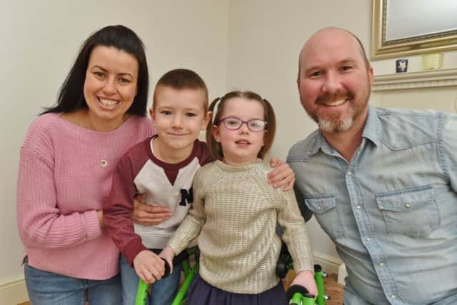 The Heriot Family at Newborough. Dad Tim, mum Fran brother Theo (6) and  Halle Heriot (4) who is waiting for an operation. EMN-170203-160704009