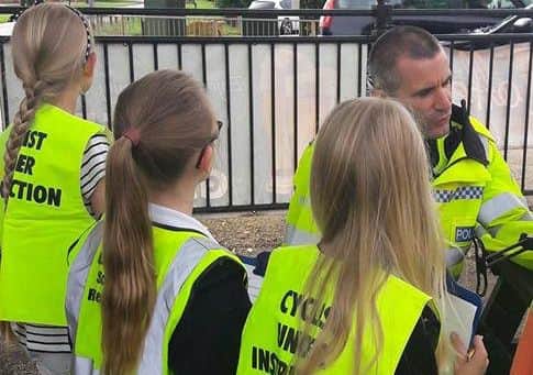 Children from Coates Primary School, with police, stopped 11 speeding drivers in the village 1CLRvEjLrGgk2SRr4Jtm