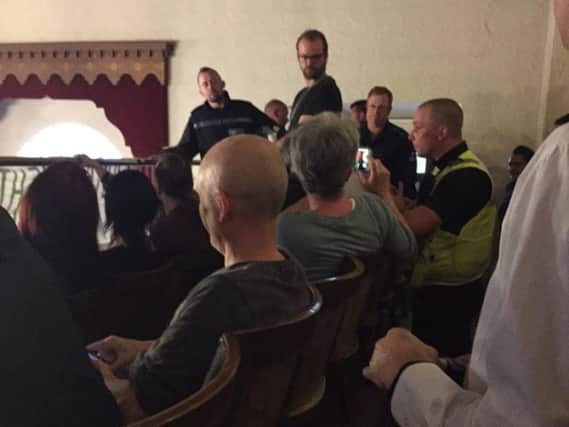 Police in the public gallery at tonight's meeting