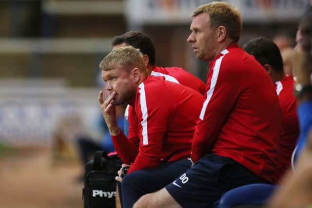 Posh manager Grant McCann watches the Ipswich game alongside assistant boss David Oldfield. Photo: Joe Dent/theposh.com.
