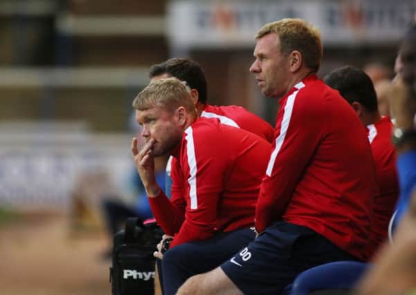 Posh manager Grant McCann watches the Ipswich game alongside assistant boss David Oldfield. Photo: Joe Dent/theposh.com.