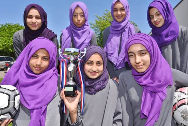 Iqra Academy with their league trophy, back row, left to right, Aisha Jakal (cpt), Khadeejah Ahsan, Yasmin Arif, Marwa Jourabi (front) Zulekha Ali, Omaya Altaf and Zainab Mahmood