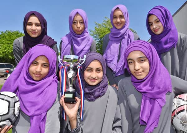 Iqra Academy with their league trophy, back row, left to right, Aisha Jakal (cpt), Khadeejah Ahsan, Yasmin Arif, Marwa Jourabi (front) Zulekha Ali, Omaya Altaf and Zainab Mahmood