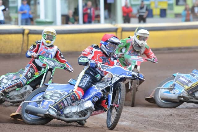 Chris Harris is the Panther in the red helmet in heat four of the meeting against Redcar. Photo: David Lowndes.