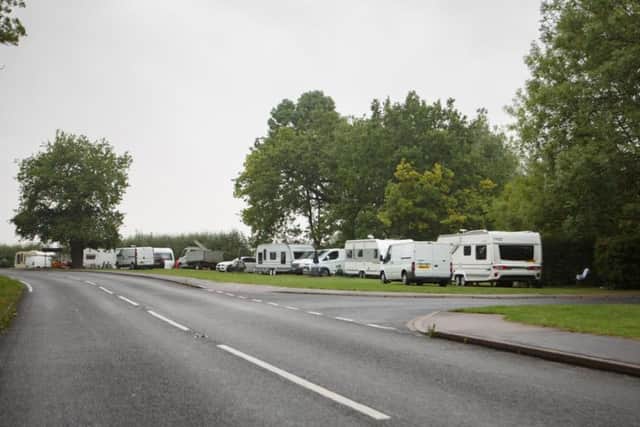 Travellers outside Peterborough Crematorium