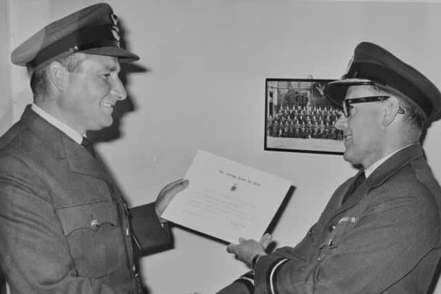 Ex-RAF navigator John Hyde of Stilton who is now learning to fly. He is looking through pics of his whilst service in the RAF EMN-170724-174937009