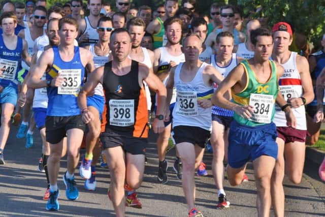 Peterborough Grand Prix 5K champion Michael Channing (right).