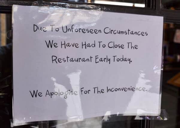 The notice in the window of the Handmade Burger Co, in Westgate, Peterborough