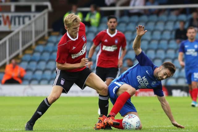 Gwion Edwards is likely to start  the League One season as a wing back.
