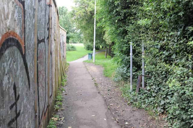 The passageway next to Yaxley Library running from Landsdowne Road to Middletons Road recreation ground EMN-170726-170426009