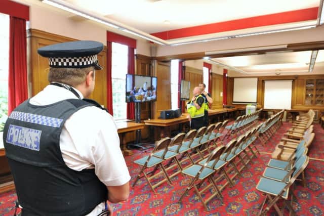 Police with the live stream inside the Bourges/Viersen room