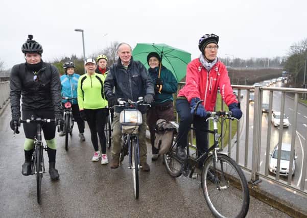 Sustrans cyclists protesting against the  proposed removal of Rhubarb Bridge, Lincoln Road EMN-170702-090952009