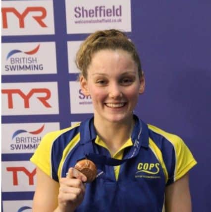Mollie Allen with her bronze medal.