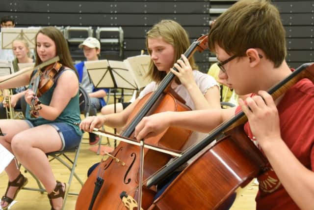 Peterborough Youth Orchestra rehearse at Ormiston Bushfield Academy for a concert at St John's churchEMN-160831-080743009
