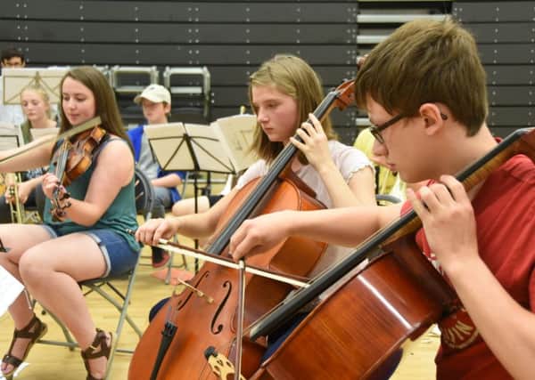 Peterborough Youth Orchestra rehearse at Ormiston Bushfield Academy for a concert at St John's churchEMN-160831-080743009