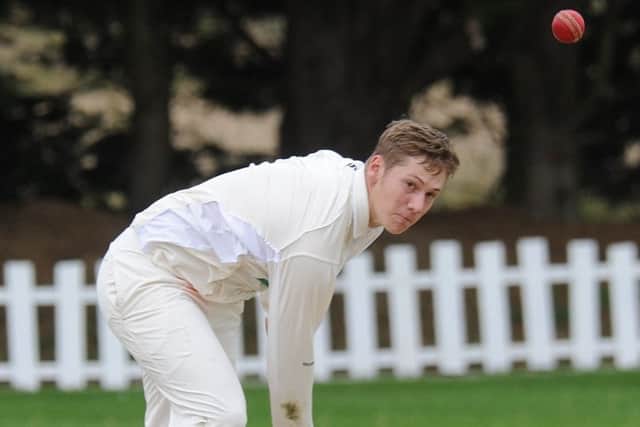 James Hook bowling for Market Deeping against Bourne.
