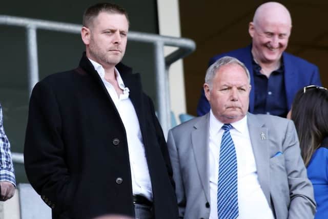 Posh chairman Darragh MacAnthony (left) has been pleased with director of football Barry Fry's work this summer.
