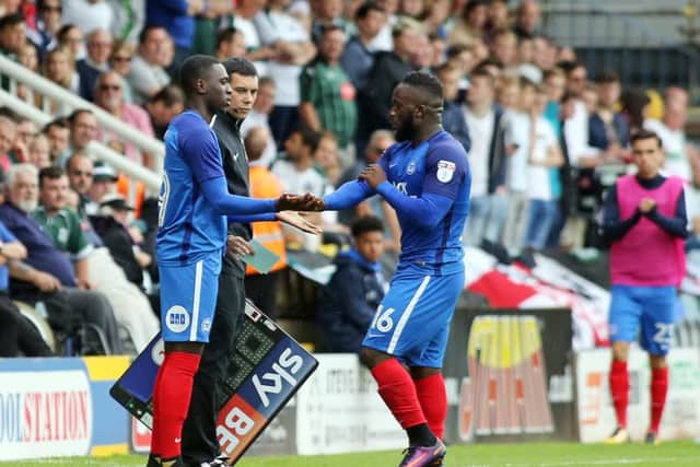 Idris Kanu (left) should be involved for Posh against Barnet.