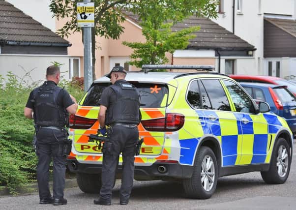 Armed police attend an incident at Sheepwalk, Paston EMN-170708-170451009
