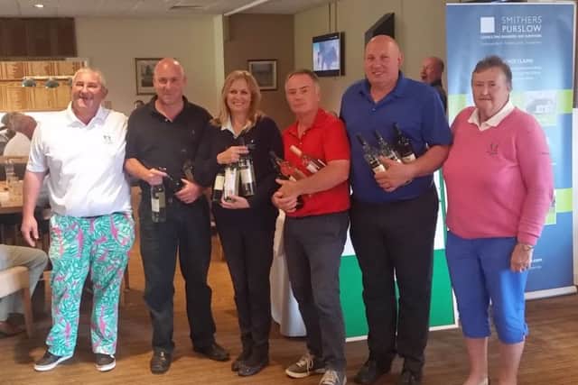 Greetham Valley captains James Ablett (left) and Annie McCulloch (right) are pictured with the winning Captains Weekend Texas Scramble team of Darren Child, Dee Hinch, Peter Wood and Mark Haynes.