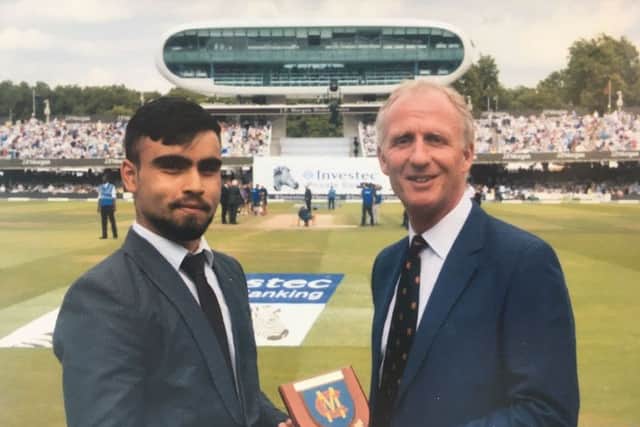 Peterborough Town teenager Mohammed Danyaal received an award at Lord's recently for scoring a hundred for a schools side against the MCC.  MCC president Matthew Fleming made the presentation.