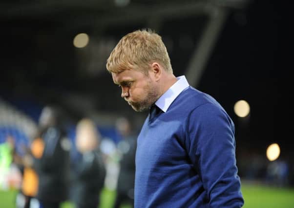 Posh boss Grant McCann after defeat at the hands of Barnet. Photo: David Lowndes.