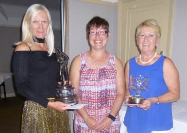Nene Park Ladies club champion Denise Payne (left) and net competition winner Barbara Bird (right) received their trophies from captain Cath Hunt at a presentation evening at The Farmers, Yaxley, which followed the Lady Captain's Day competition.