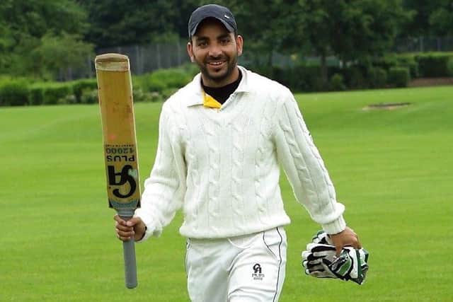 Adnan Latif after scoring 119 not out for Sheikh 11 against Warboys.