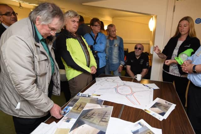 Residents at the Salvation Army Citadel see the plans