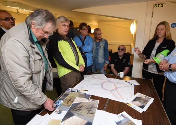 Residents at the Salvation Army Citadel see the plans