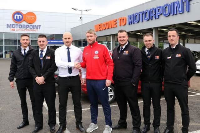 Grant McCann with Lee Watson and the Motorpoint Peterborough sales team.