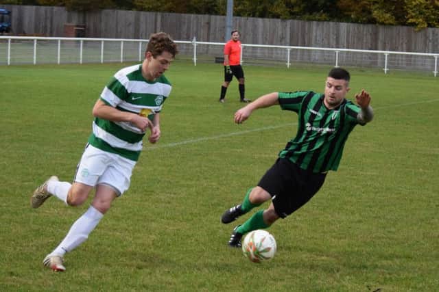 Lewis Leckie (right) scored twice for Holbeach against ON Chenecks.