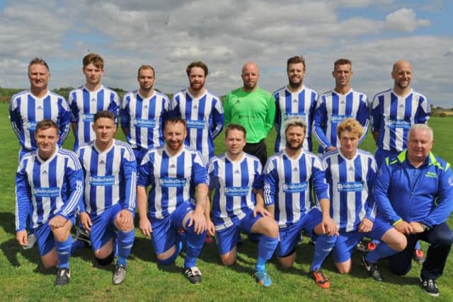 Moulton Harrox face the camera before a 1-0 Peterborough Premier Division win at AFC Stanground Sports, back row from left,  Nigel Steadman, Louis Steadman, Phil Groves, Jake Cawthorne, Wayne Wilding, Ashley Coddington, Jake Mason, Matthew Watkin, front, Josh McGuire, Ian Bradbury, Bobby Patterson, Robbie Relf, Dan Woods, Marcus Parry, Paul Crowson.
