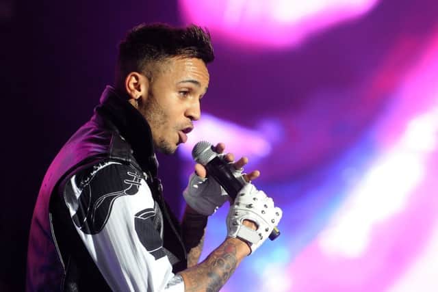 Aston Merrygold of JLS performs on stage during their Goodbye Tour at the LG Arena, Birmingham.  Photo credit Joe Giddens/PA Wire ENGEMN00120131223151906