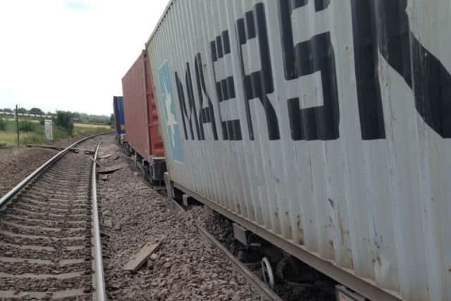 The scene of the derailed train