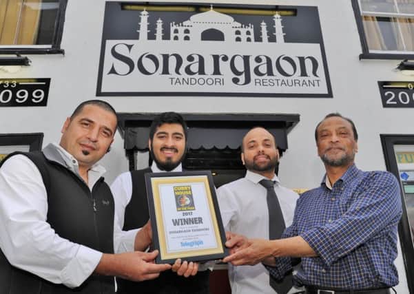 Peterborough Telegraph curry house competition winners Sonargaon Tandoori at Market Square, Whittlesey -  L to R  Jasem Ahmed, Sulayman Uddin, Syduzzaman  Rizve and Abdul Kahar EMN-170815-084845009