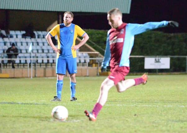 Scott Coupland scored twice for Deeping at Yaxley including a penalty.