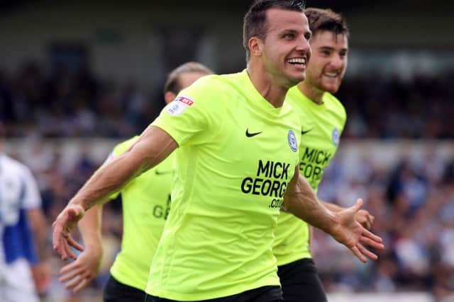 Steven Taylor celebrates his goal for Posh at Bristol Rovers.