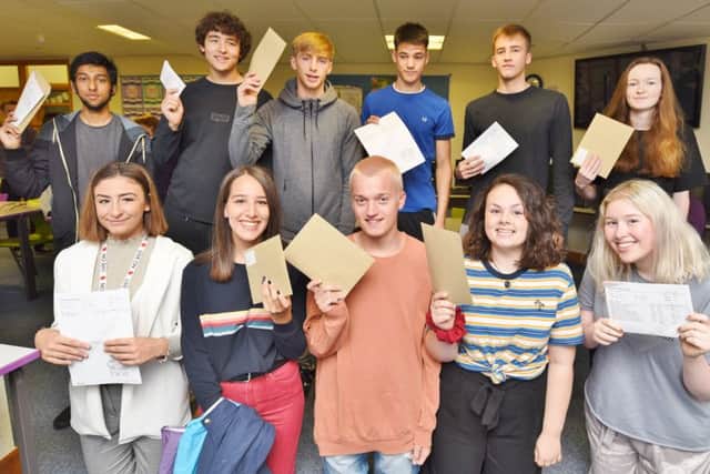 A Level Day at Hampton College. Some of the 6th formers with their results. EMN-170817-112528009