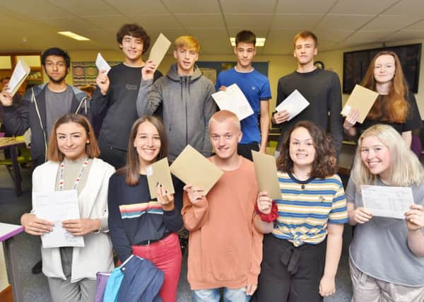 A Level Day at Hampton College. Some of the 6th formers with their results. EMN-170817-112528009