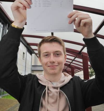 A Level Day at St John Fisher School. Top student Harry Davey A*A*A EMN-170817-112807009