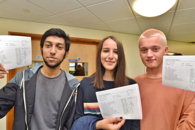 A Level Day at Hampton College.   6th formers with their results. Aaron Patel A*A*A, Bailey Richards A*A*A, Aicha Sebtane AA*A EMN-170817-112617009
