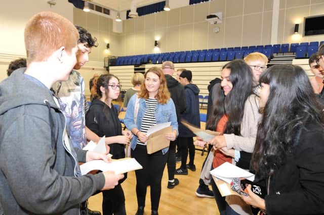 A Level Day at The Voyager Academy Some of the 6th formers with their results. EMN-170817-112845009