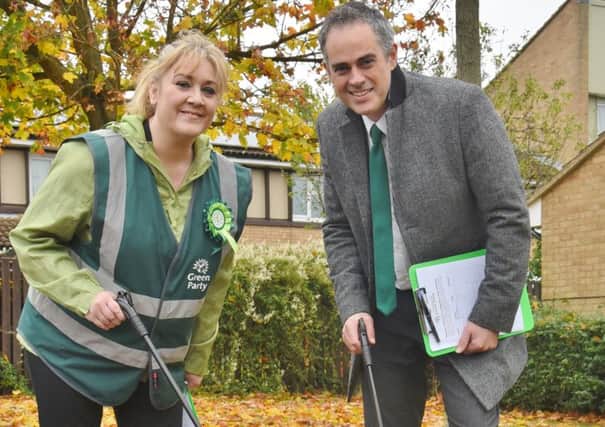 Local Green Party member  Julie Howell attending a litter pick at Beckingham with  Jonathan Bartley EMN-160111-154924009