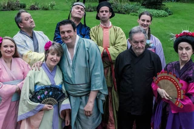 Back Row, L-R: Pooh-Bah (Simon Blenkin), The Mikado (Tony Smith), Pish-Tush (Philip Dawson), Peep-Bo (Cat Johnson)
Front Row, L-R: Pitti-Sing (Mel Ewles), Yum-Yum (Sue Goldspink), Nanki-Poo (Mike Hammond), Ko-Ko (John Torr), Katisha (Julie Bjerregaard)