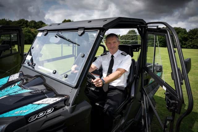 Chief Constable of Lincolnshire Police, Bill Skelly, in one of the vehicles.