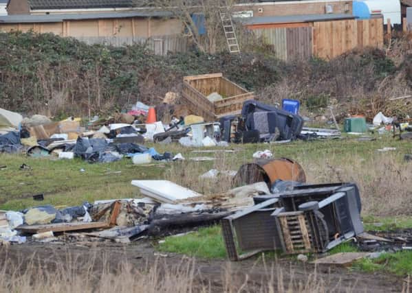 Land at Oxney Road covered in rubbish EMN-161231-123643009